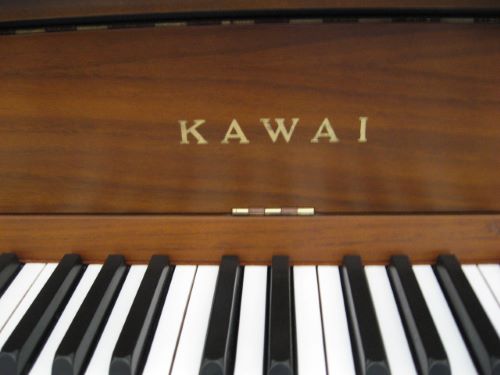 Kawai model 801-I Console Piano Logo at 88 Keys Piano Warehouse & Showroom