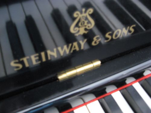 Steinway Contemporary Console Piano model 100 logo at 88 Keys Piano Warehouse & Showroom