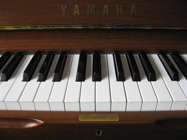 Yamaha model U1 Studio Upright Piano in Walnut Decal at 88 Keys Piano Warehouse & Showroom