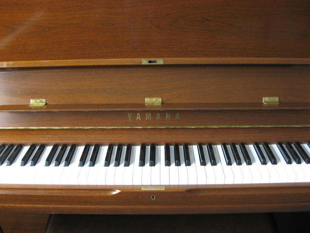 Yamaha model U1 Studio Upright Piano in Walnut Keyboard at 88 Keys Piano Warehouse & Showroom