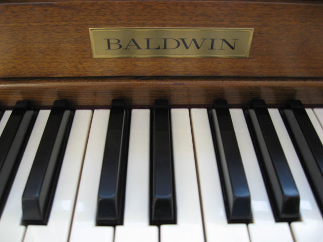 Baldwin Walnut Console Piano Decal at 88 Keys Piano Warehouse & Showroom