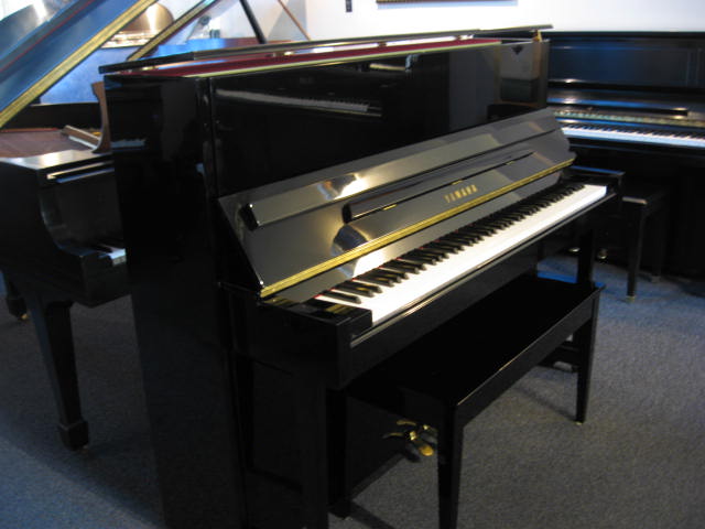 Yamaha model T118 Studio Upright Piano 2 Bass at 88 Keys Piano Warehouse